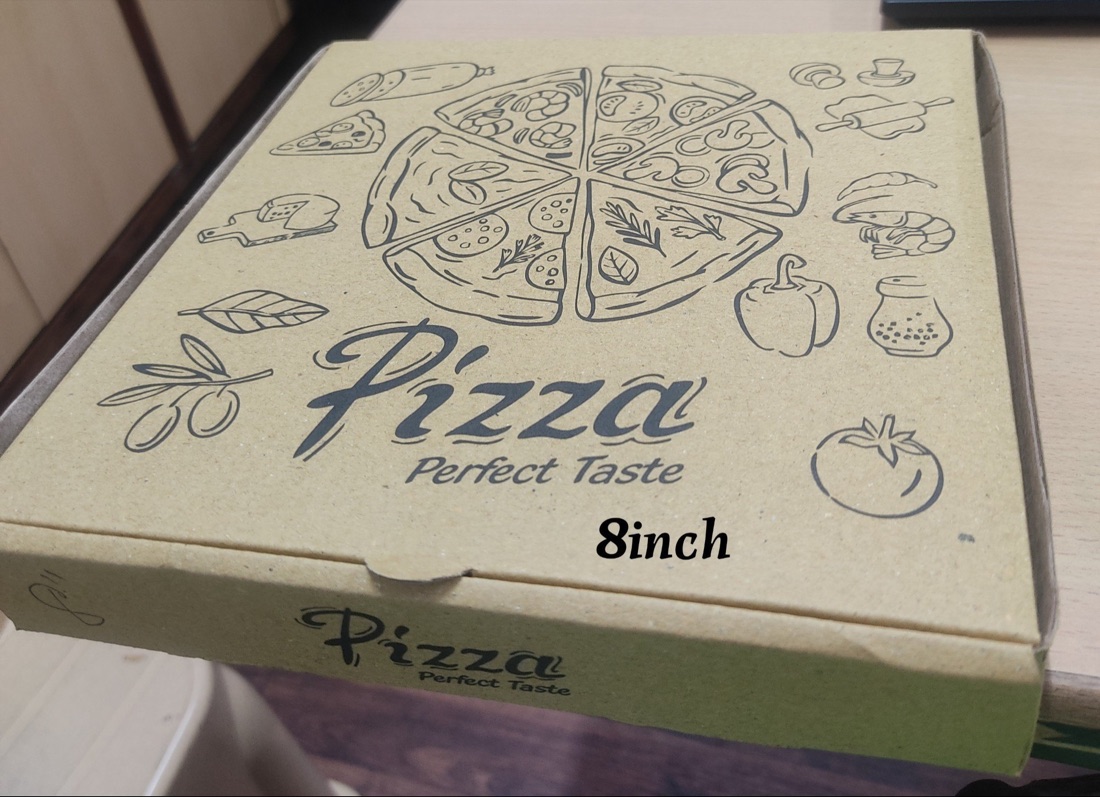 Printed corrugated pizza box with a hand-drawn pizza design